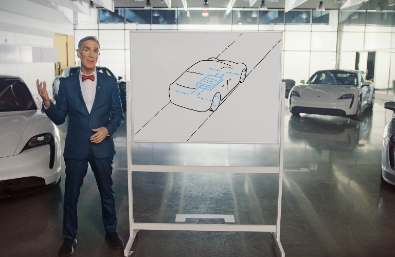 Bill Nye explaining the power in the Taycan