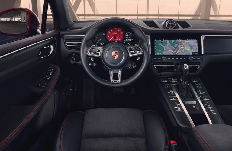2021 Porsche Macan dashboard view with steering wheel and gearbox