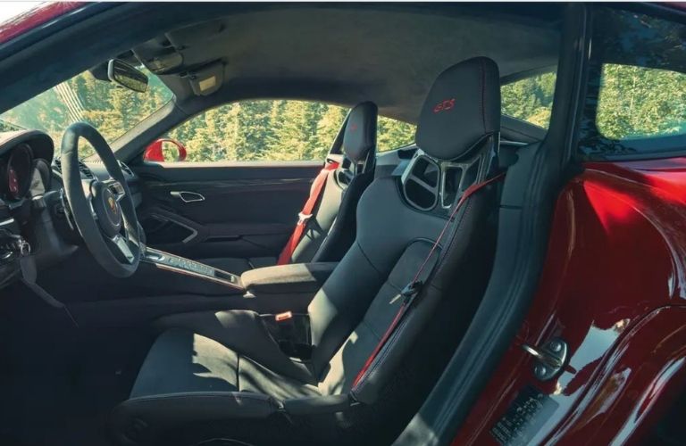 The Interior Cabin displaying the dashboard and steering wheel of the 2022 Porsche 718 Boxster