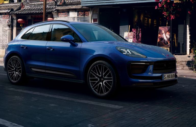 Front-quarter view of the 2026 Porsche Macan Blue