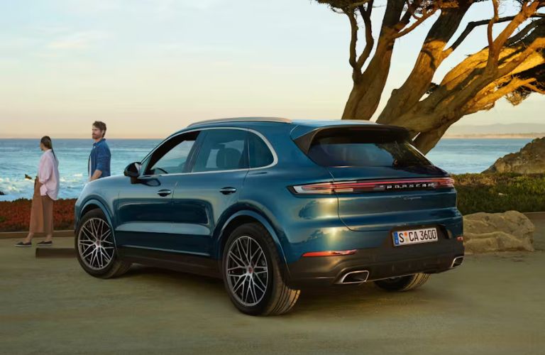 Rear-quarter view of the 2026 Porsche Cayenne Blue